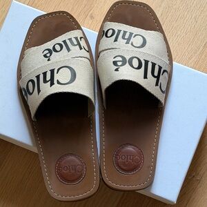 Chloé Woody Flat Mules Canvas Logo Slide Sandals in Beige and Brown